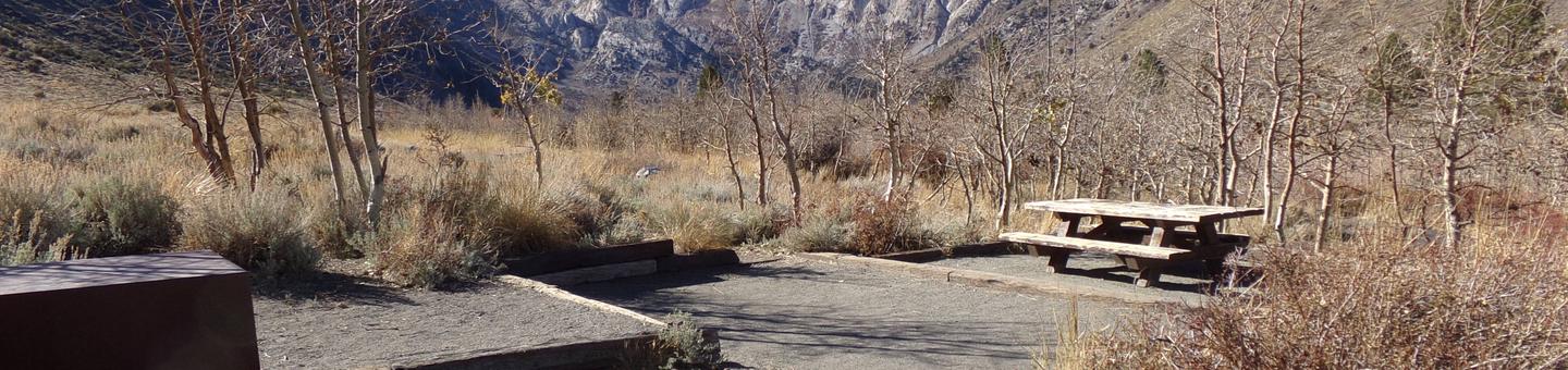 Picnic table and camping space view at site #15 at Convict Lake Campground. 