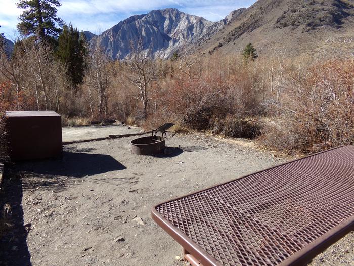 Convict Lake Campground site #27 featuring treed camp space by creek, fire pit, and camping space. Convict Lake Campground site #27 featuring treed camp space by creek, fire pit, and camping space. Full mountain views. 