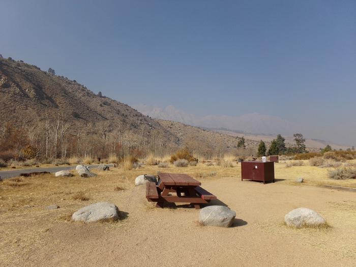 Alternate view of site #11 featuring mountain panoramic mountain views at Four Jeffery Campground. 