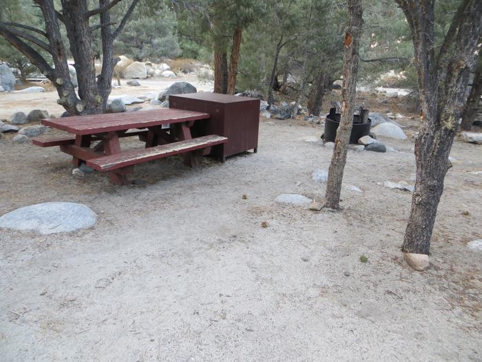 French Camp site #75 featuring picnic table, food storage, and fire pit in this mountain top setting. 
