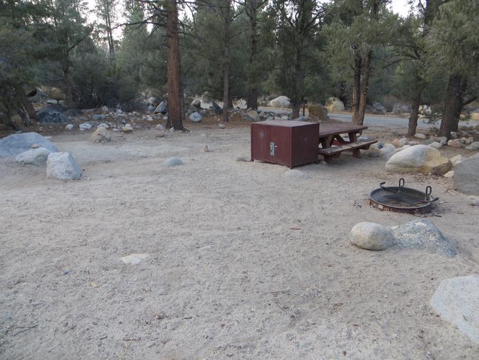 French Camp site #80 featuring picnic table, food storage, and fire pit in this mountain top setting. 