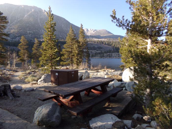 Rock Creek Lake Campground site #04 featuring picnic table, food storage, and fire pit.