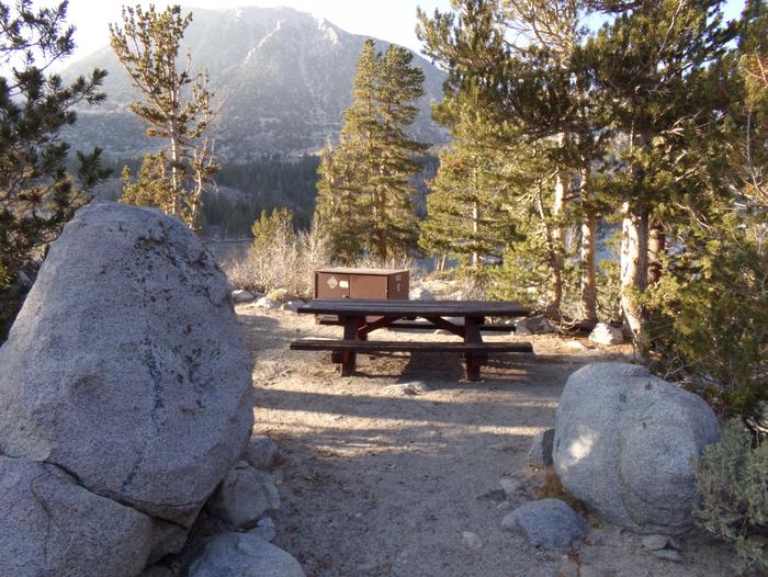 Rock Creek Lake Campground site #05 featuring picnic table, food storage, and fire pit.