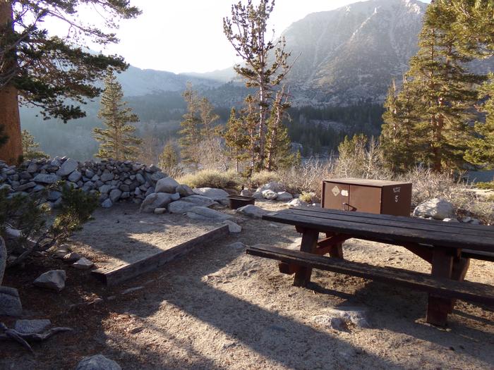 Rock Creek Lake Campground site #05 featuring picnic table, food storage, and fire pit.