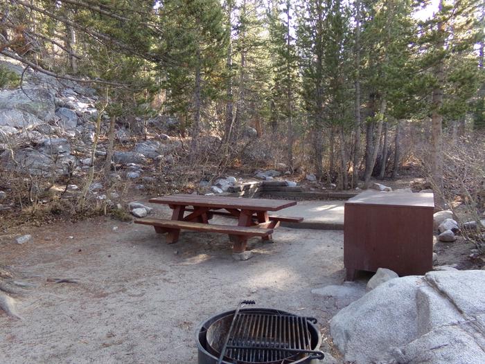 Rock Creek Lake Campground site #19 mountain top setting featuring picnic and camping areas. 
