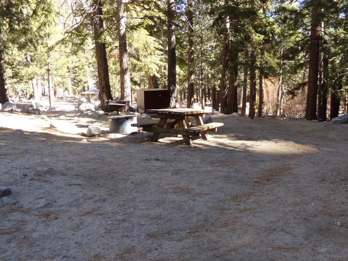 Mt. Whitney Portal Campground site #03 featuring mountain top setting with picnic area and camping space. 