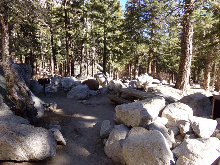 Mt. Whitney Portal Campground site #05 featuring mountain top setting with picnic area and camping space. 