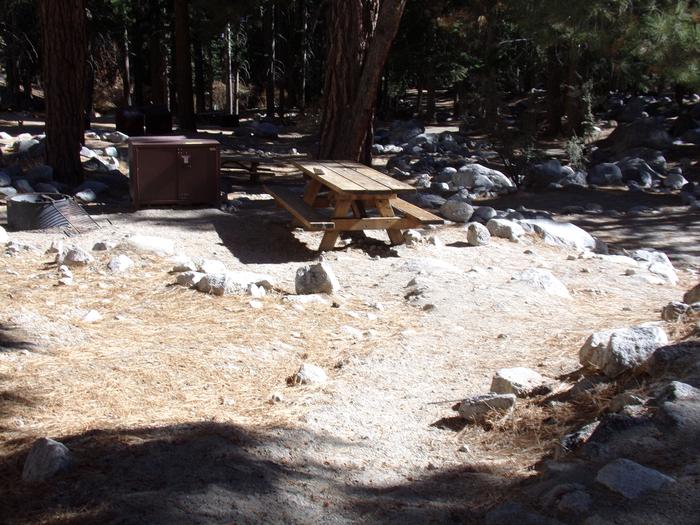 Mt. Whitney Portal Campground site #25 featuring the mountain top setting picnic area with fire pit. 