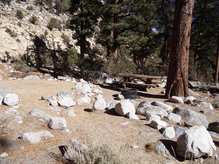 Mt. Whitney Portal Campground site #31 featuring the mountain top setting picnic area and camping space. 