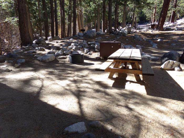 Mt. Whitney Portal Campground site #33 featuring the mountain top setting picnic area and camping space. 