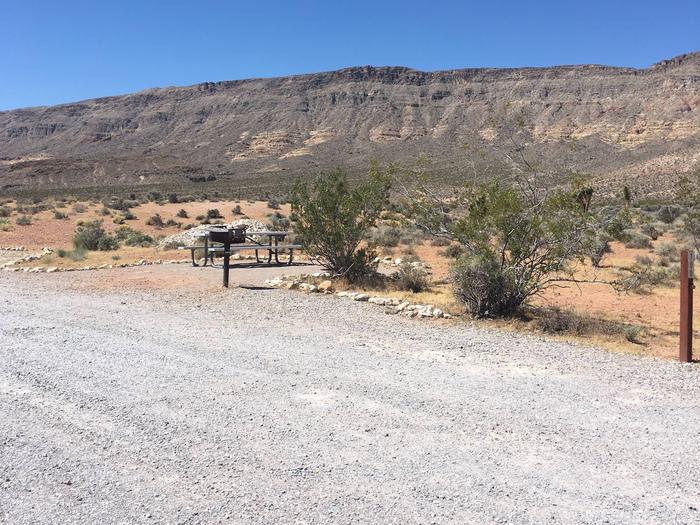 Red Rock Canyon Campground RV Site- No Shade Shelter NO tent pads Vault toilet,Grill, NO Fire PitRed Rock Canyon Campground RV Site - Nearby  Vault toilet, Grill,  Parallel park .No Shade Shelter , tent pad or fire pits.
