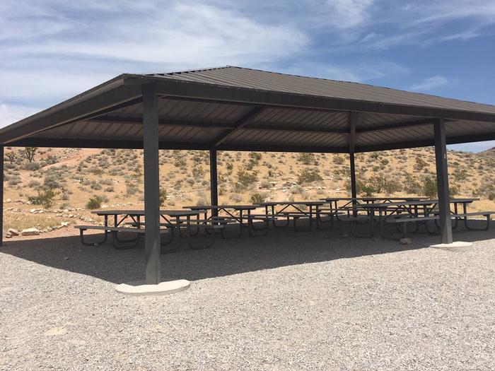 Red Rock Canyon Campground Group Shelter- 10  small tent pads 8 vehicles max, Vault toilet shared with site F&G Red Rock Canyon Campground Group Shelter  10  small tent pads 8 vehicles max
Vault toilet shared with site F