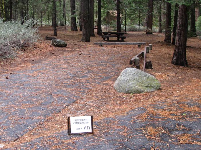Paved site with picnic table and fire ringPinecrest Campground Site A17
