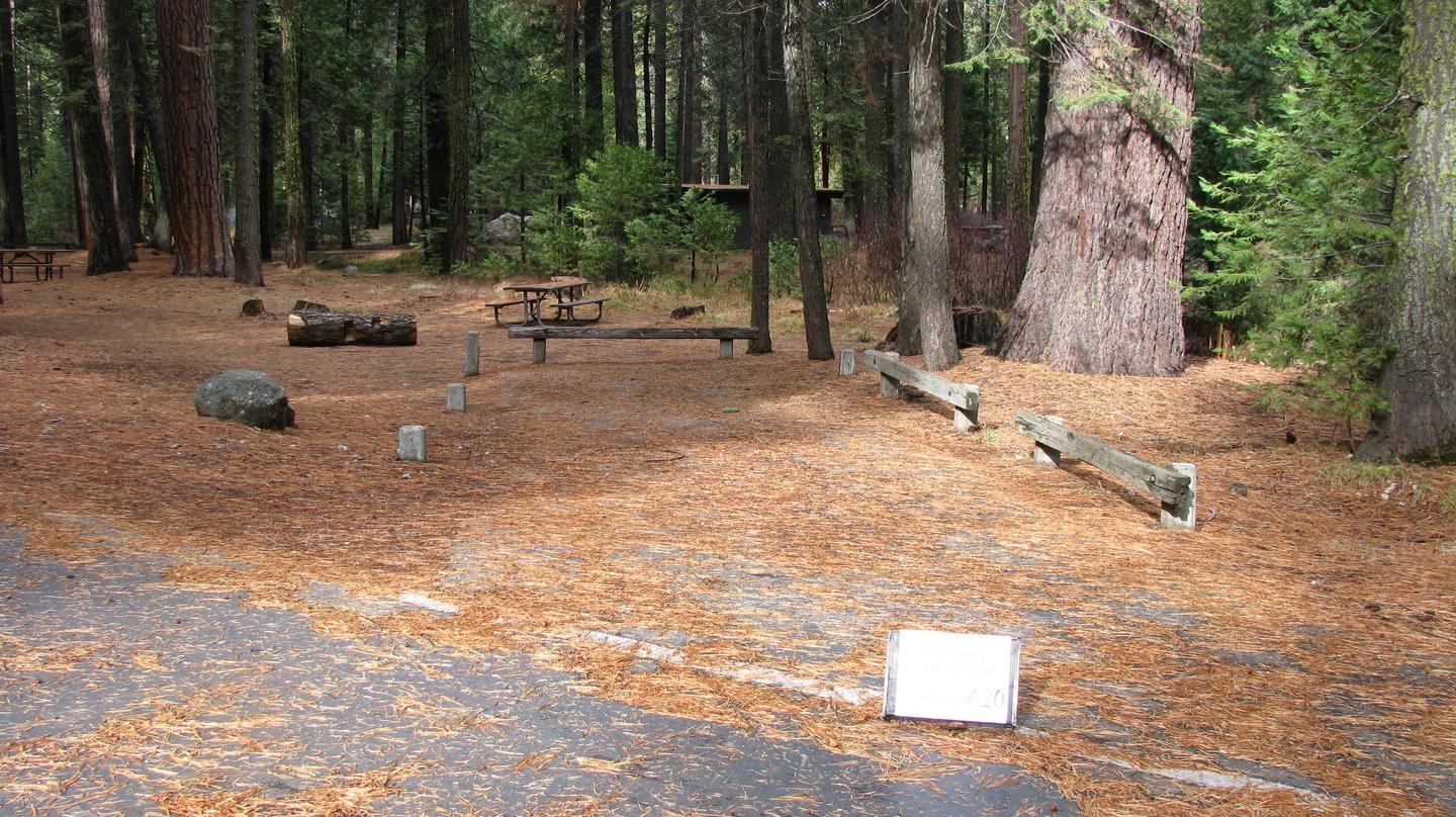Paved site with picnic table and fire ringPinecrest Campground Site A20