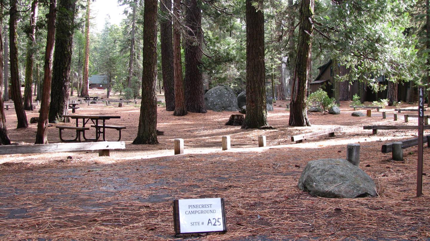 Paved site with picnic table and fire ringPinecrest Campground Site A25
