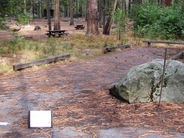 Paved site with picnic table and fire ringPinecrest Campground Site A38