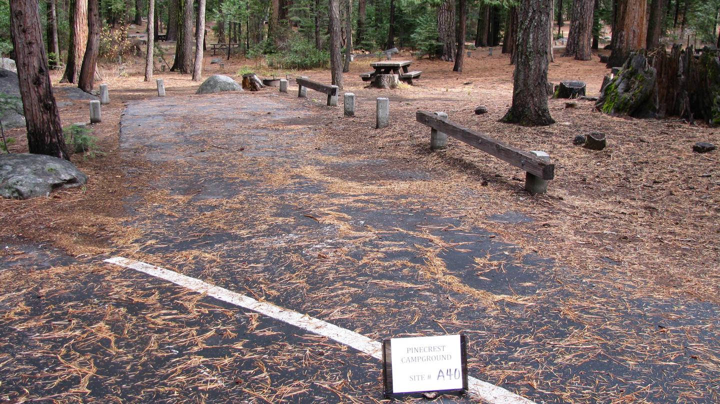 Paved site with picnic table and fire ringPinecrest Campground Site A40