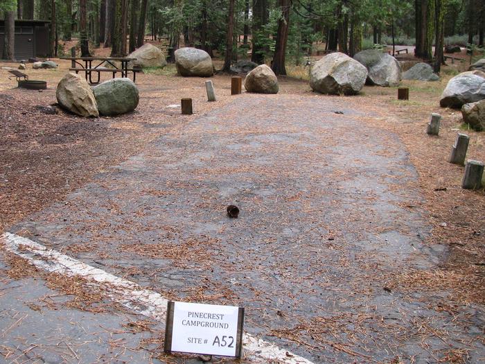 Paved site with picnic table and fire ringPinecrest Campground Site A52