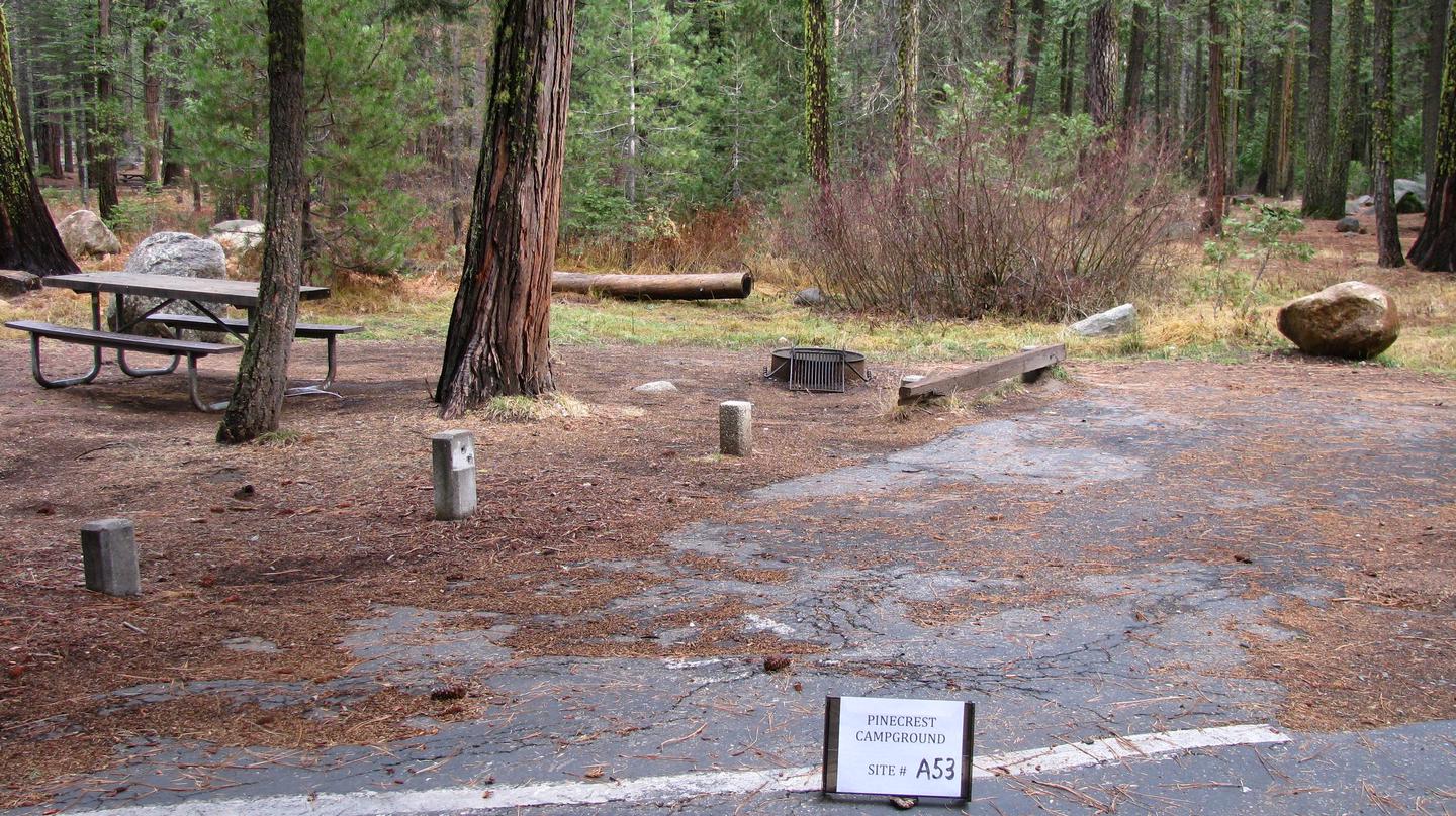 Paved site with picnic table and fire ringPinecrest Campground Site A53