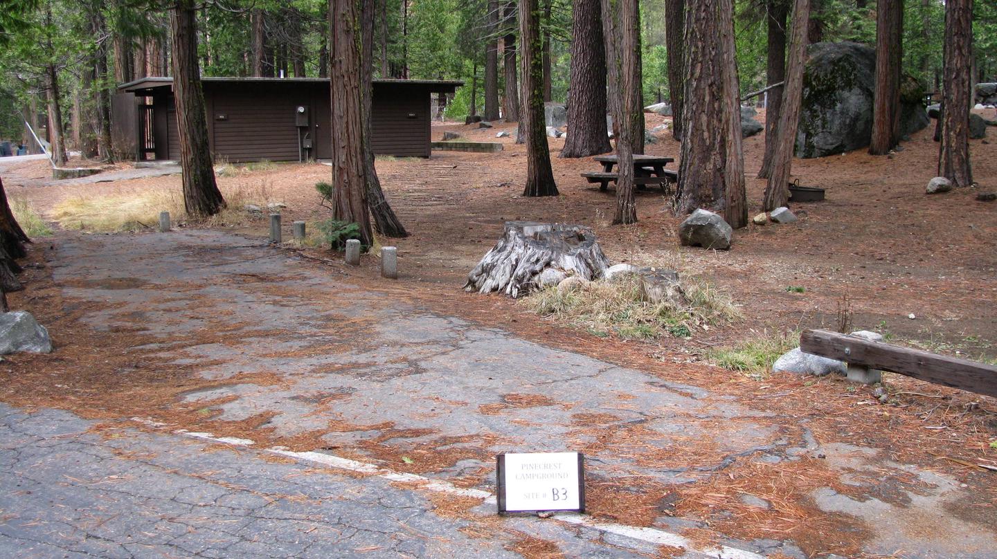 Paved site with picnic table and fire ringPinecrest Campground Site B3