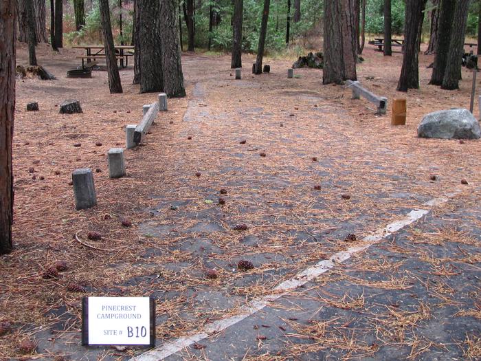 Paved site with picnic table and fire ringPinecrest Campground Site B10