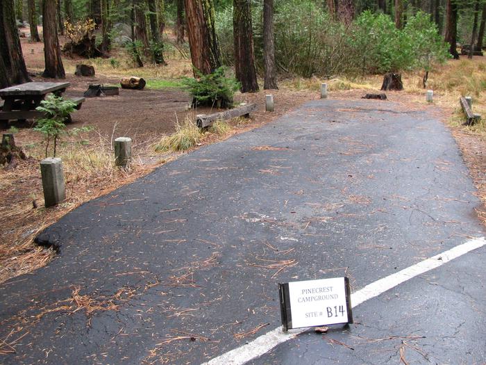 Paved site with picnic table and fire ringPinecrest Campground Site B14