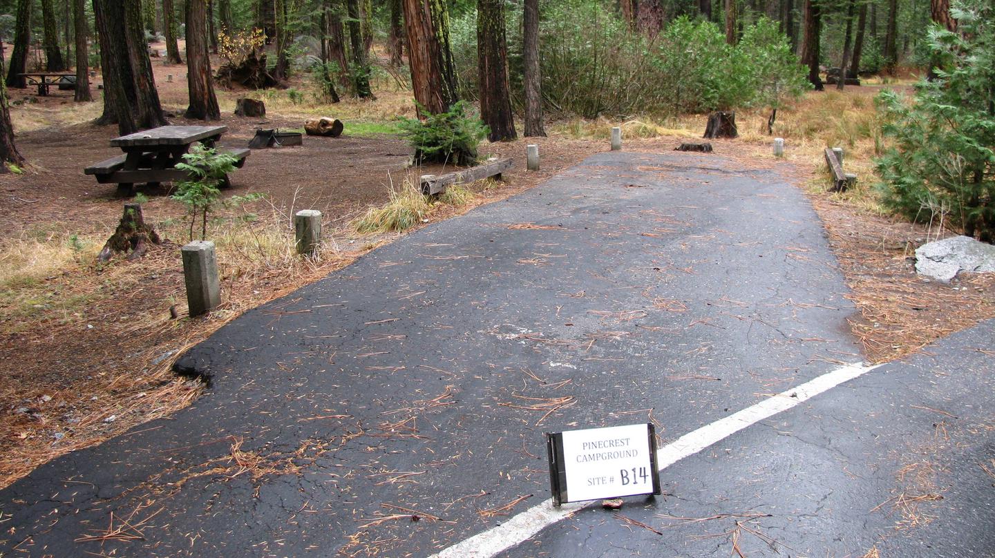 Paved site with picnic table and fire ringPinecrest Campground Site B14