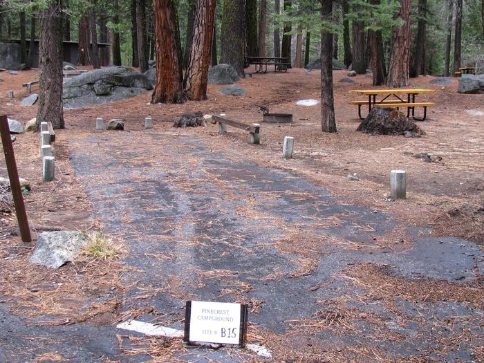 Paved site with picnic table and fire ringPinecrest Campground Site B15