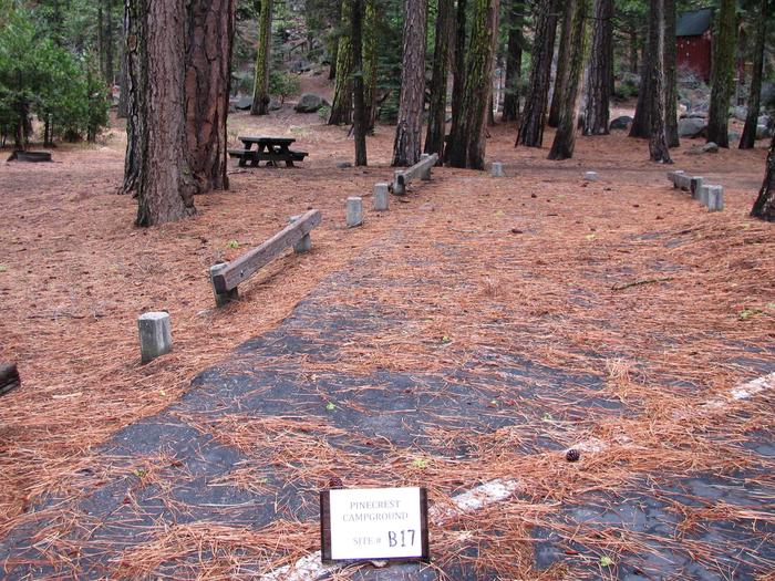 Paved site with picnic table and fire ringPinecrest Campground Site B17