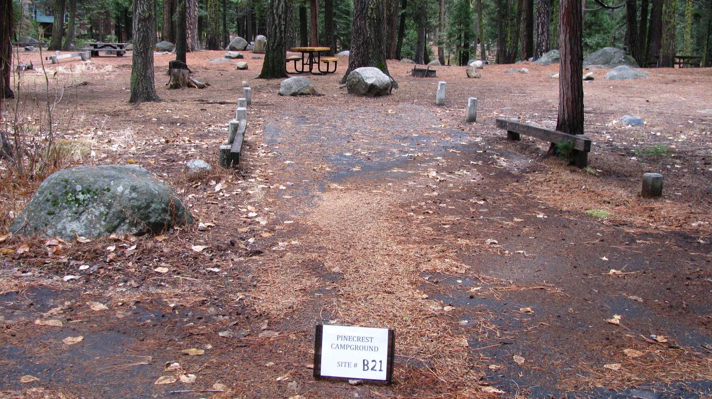 Paved site with picnic table and fire ringPinecrest Campground Site B21