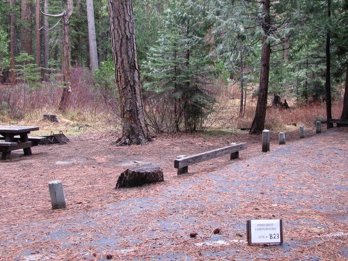 Paved site with picnic table and fire ringPinecrest Campground Site B23