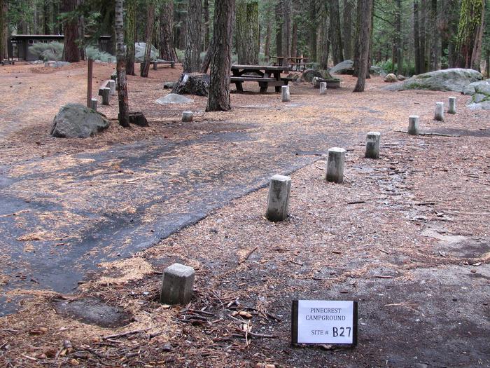 Paved site with picnic table and fire ringPinecrest Campground Site B27