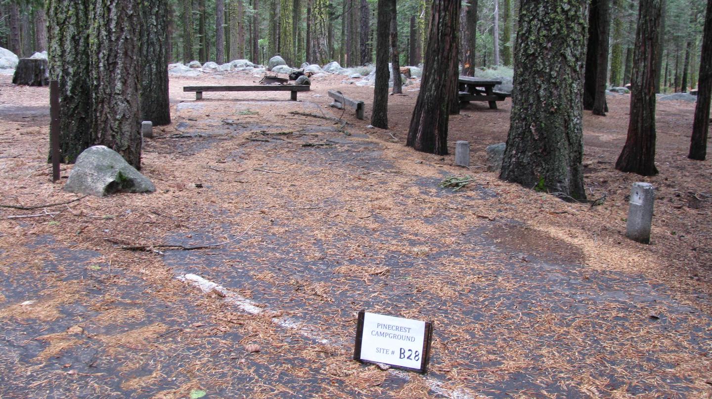 Paved site with picnic table and fire ringPinecrest Campground Site B28