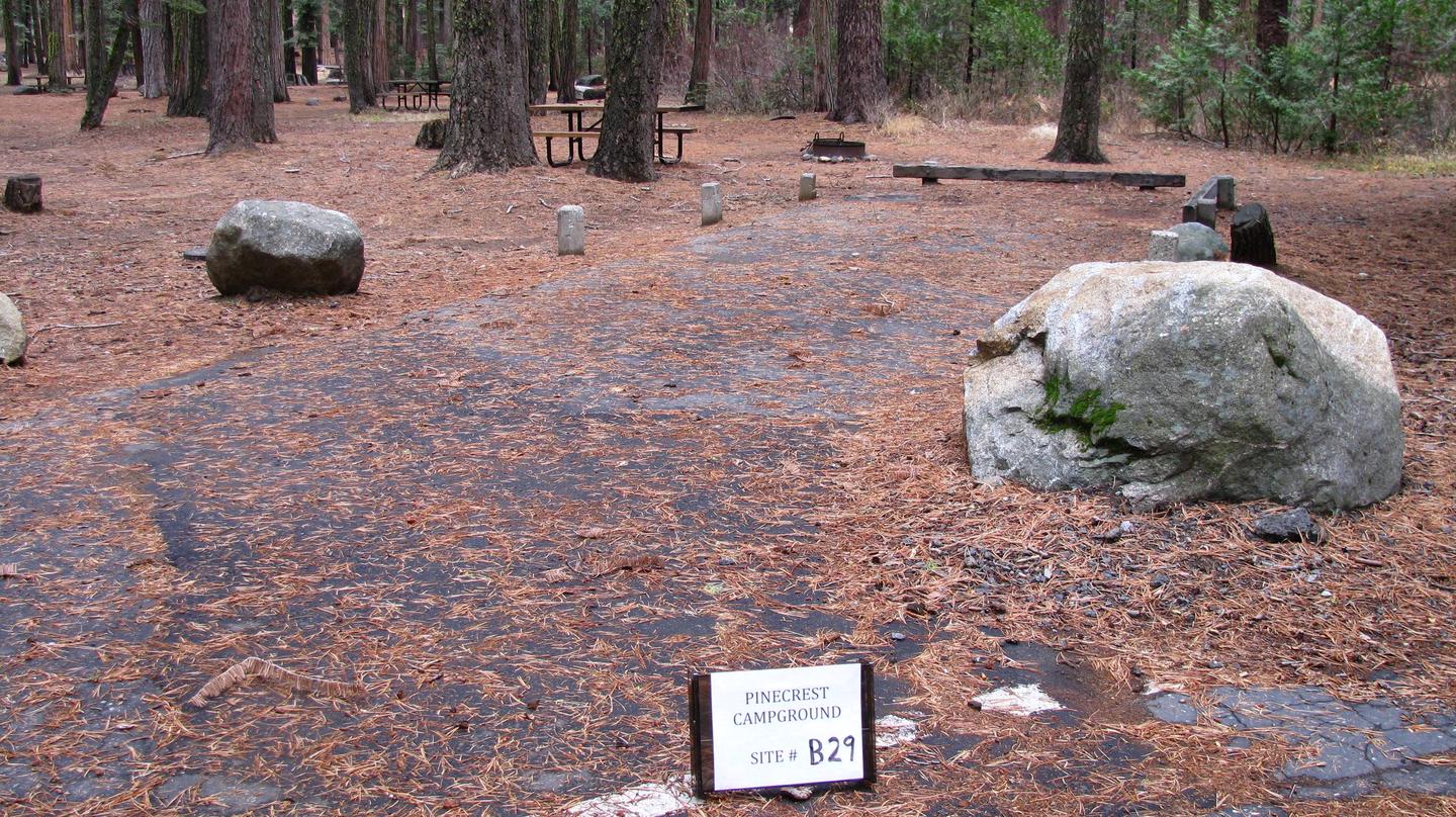 Paved site with picnic table and fire ringPinecrest Campground Site B29
