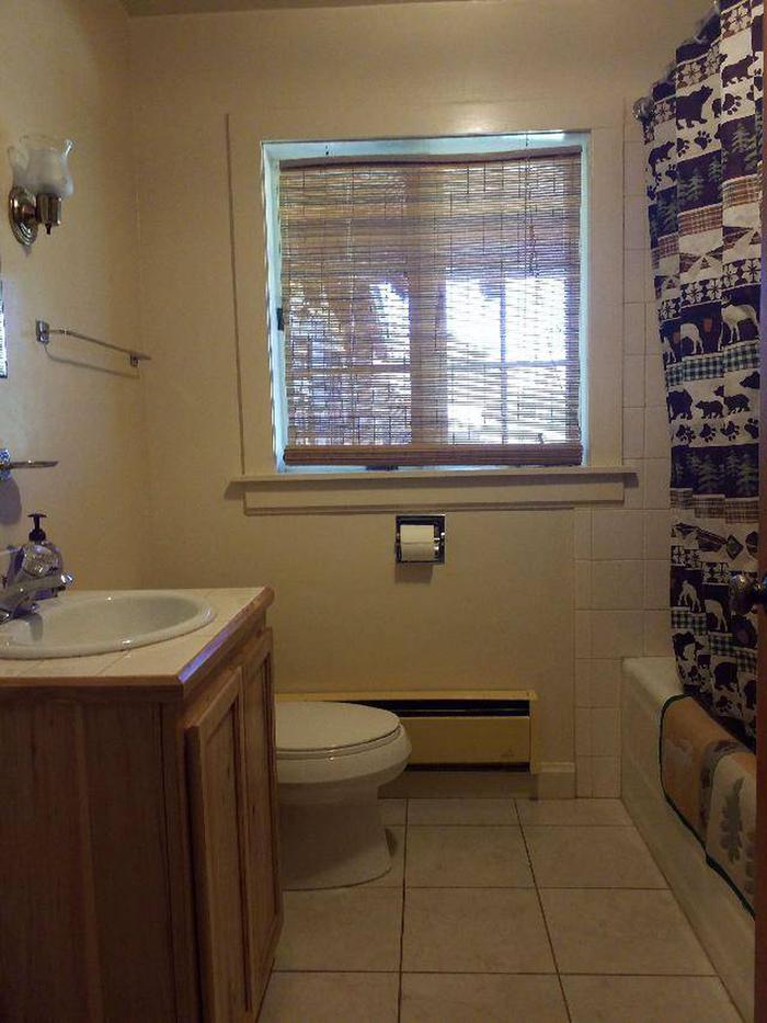 Sunlight Rangers Cabin - Bathroom, toilet, sink, tubBathroom containing toilet, full bath, sink