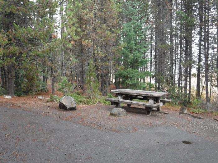 Campsite with one picnic table and fire ring.002