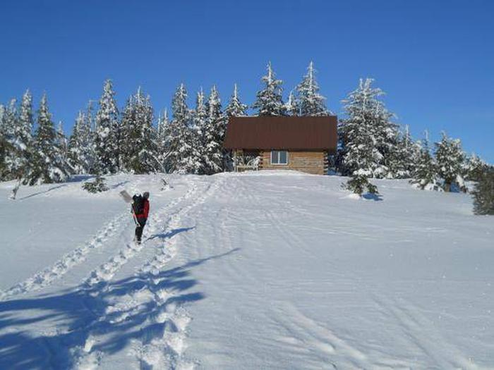 Snowshoeing to the cabin in the winter