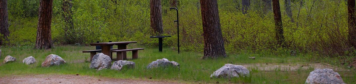 Relax amongst the pine trees that surround your sites and that have picnic table, BBQ stand, fire pit, and lantern holders for your convenience.Dog Creek Campground