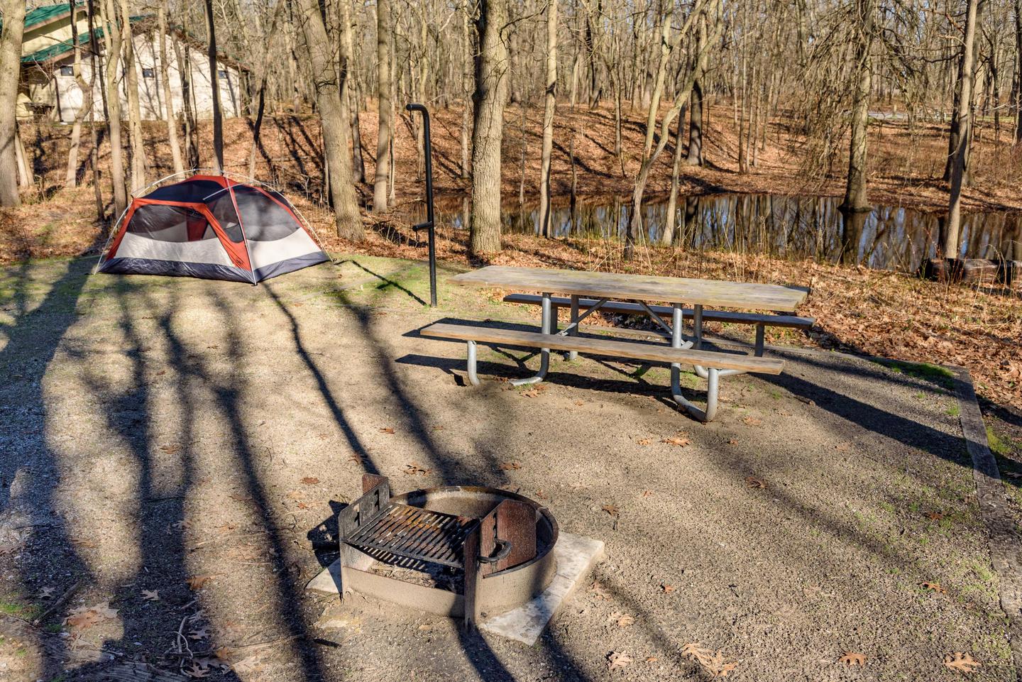 52 foot driveway with nice shaded tent pad.Campsite M32