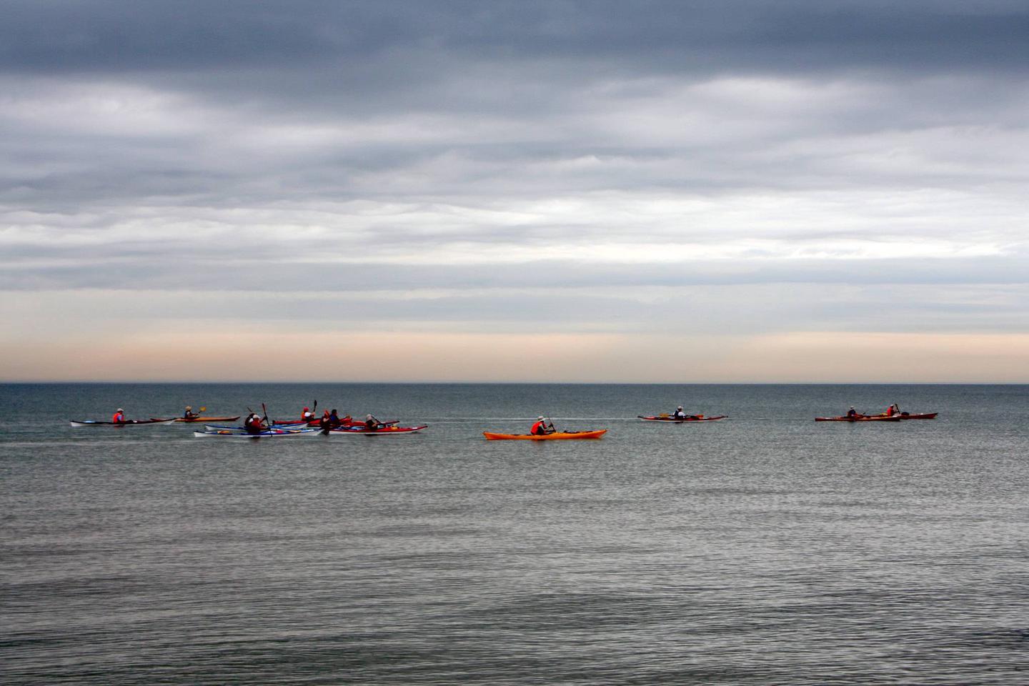 Kayakers on Lake Michigan along the Indiana Dunes National Park.