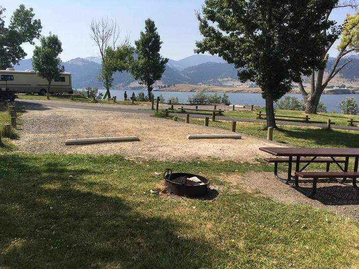 Site 9 is an interior campsite at Holter Lake Campground. Holter Lake is viewable from Site 9. Campsites are in between the lake and Site 9.Site 9 BLM Holter Lake Campground. 