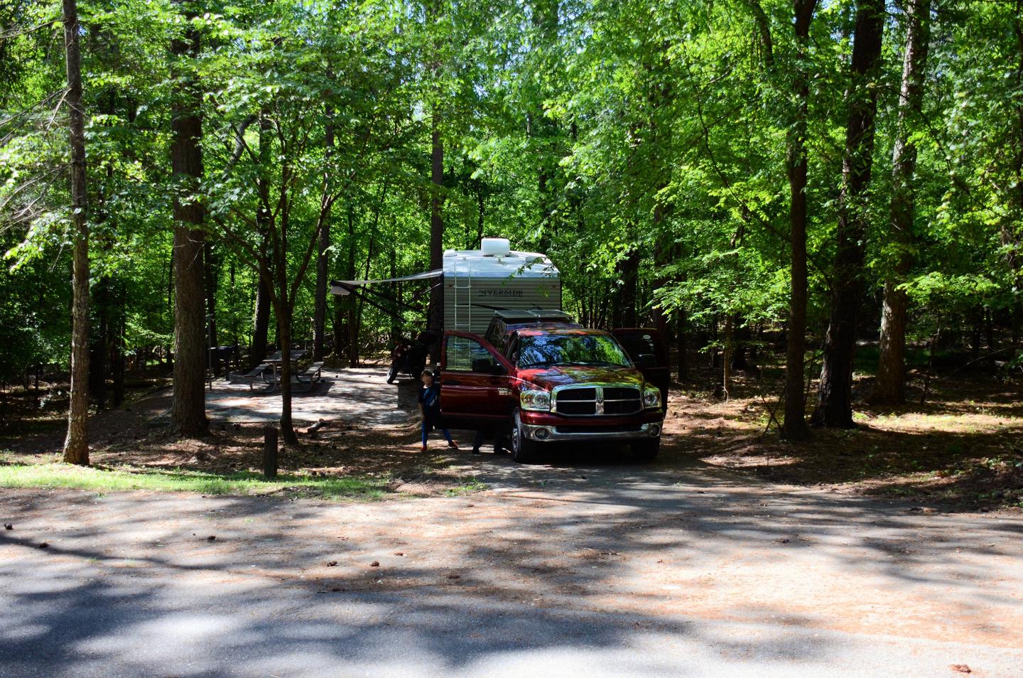 Driveway entrance/slope, awning-side clearance.McKinney Campground, campsite 60.