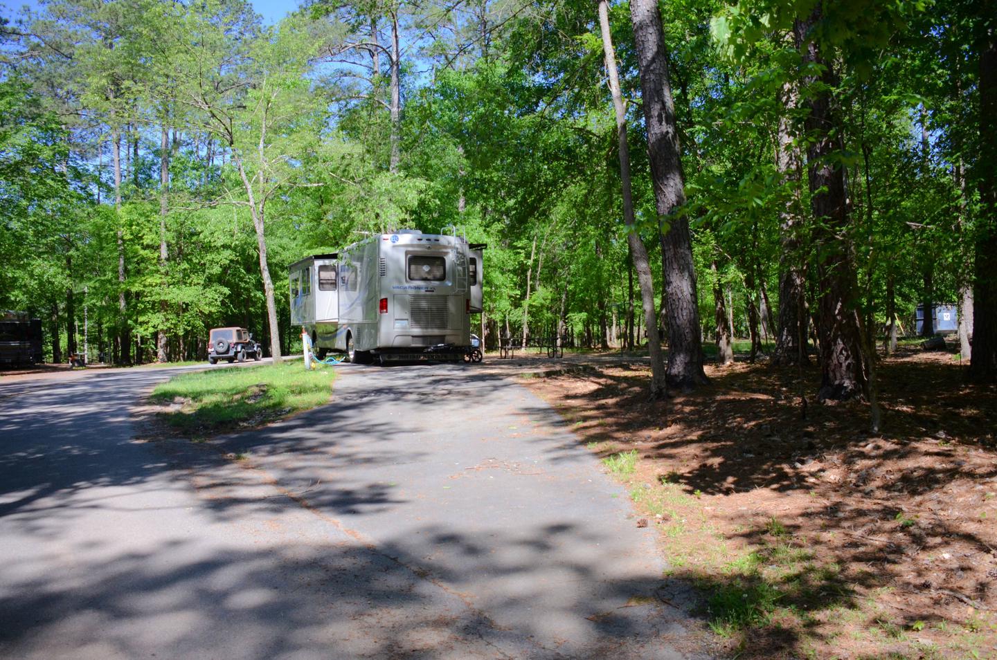 Pull-thru entrance, driveway slope, utilities-side clearance.McKinney Campground, campsite 74.
