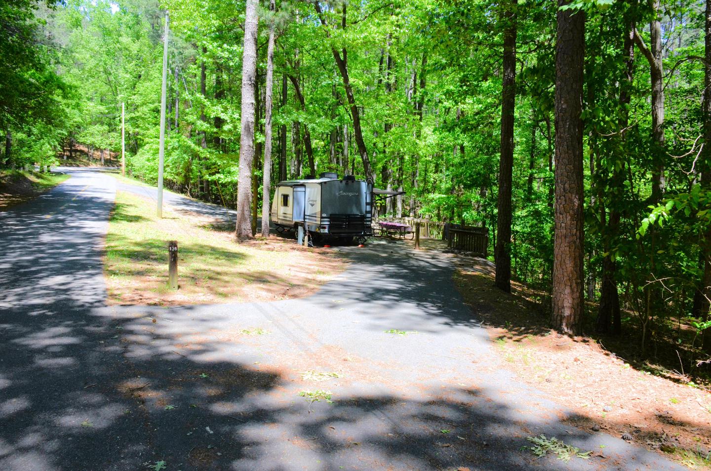 Pull-thru entrance, driveway slope, utilities-side clearance.McKinney Campground, campsite 138.
