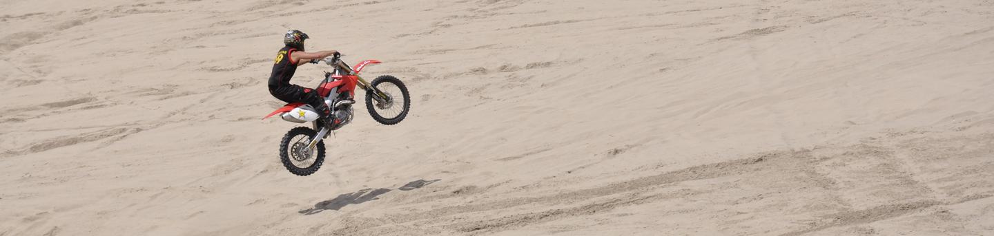 Motorcycle rider at Weiser Dunes