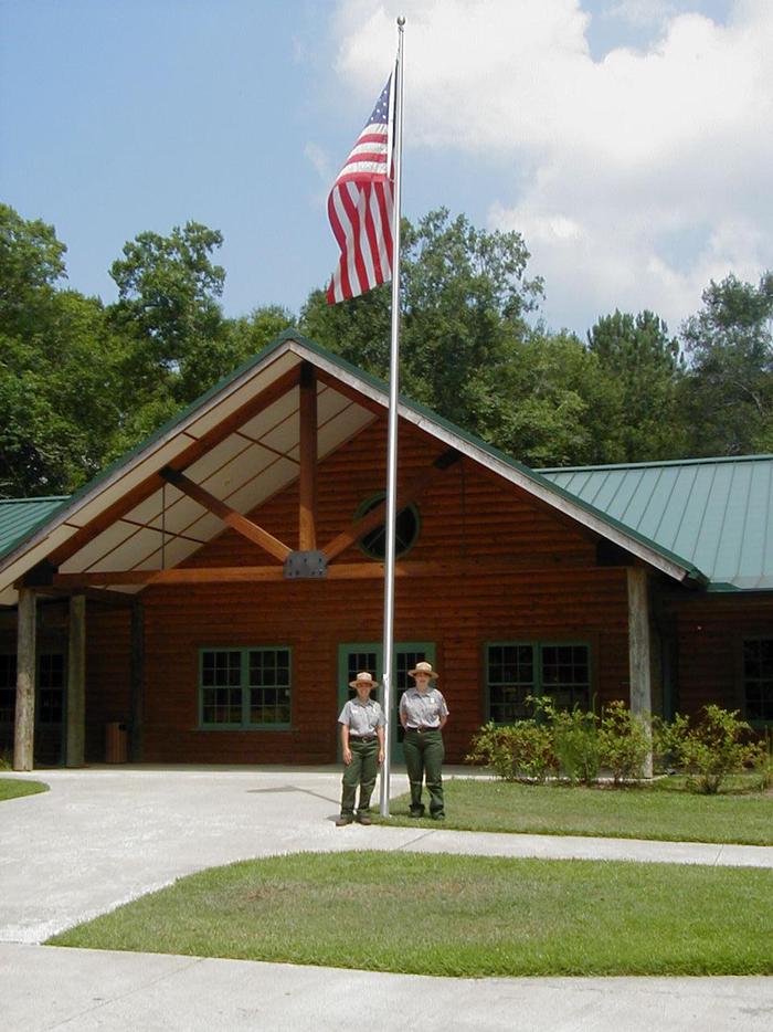 Rangers in front of visitor centerThe visitor center is open daily from 9 am to 5 pm.
