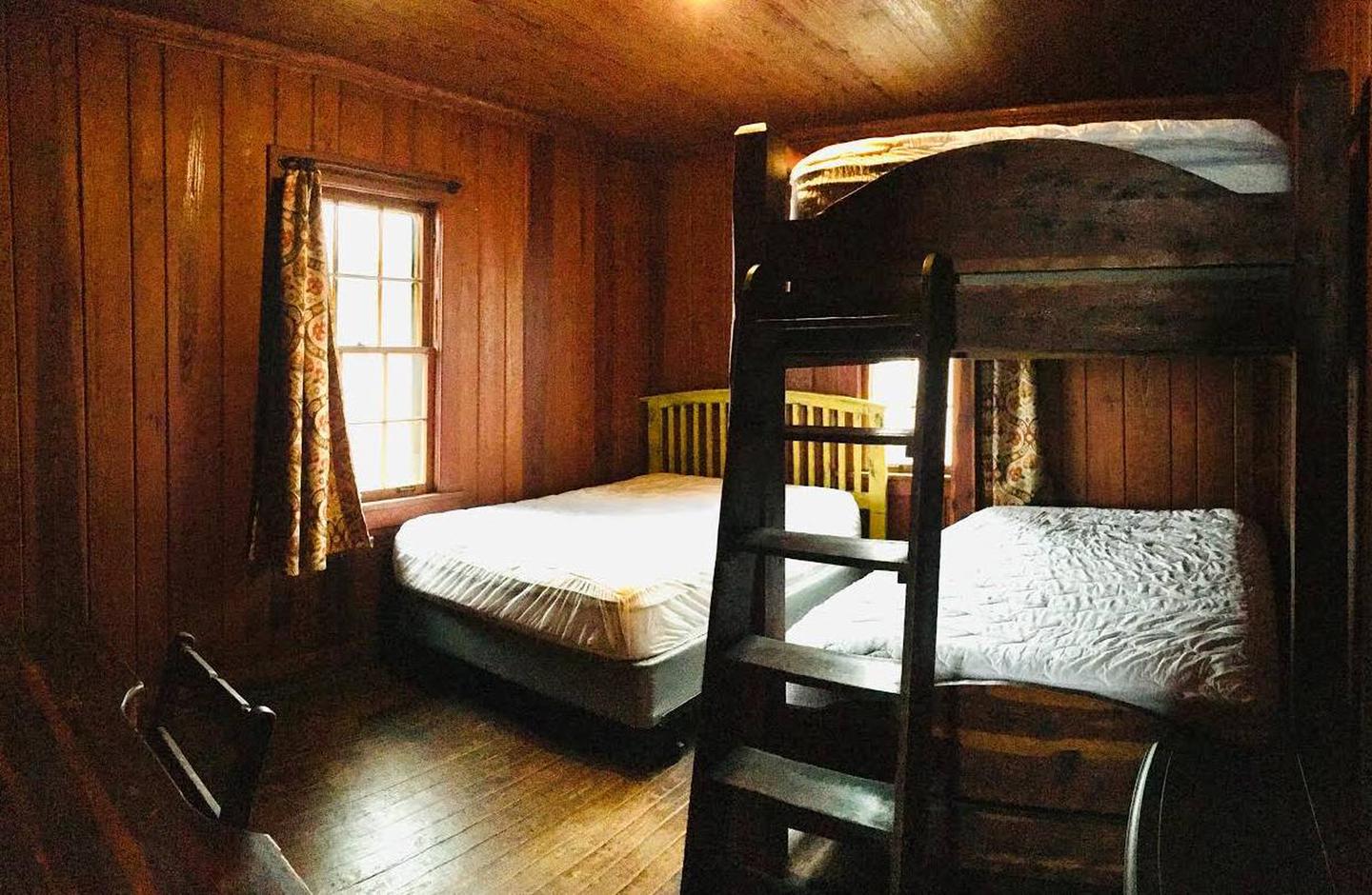 White Rock Mountain, Cabin B Bedroom with one full sized bed and one full sized bunkbed.Cabin B bedroom has one full sized bed and one massive full sized bunkbed, new premium mattresses, clean mattress covers, electric stove.
