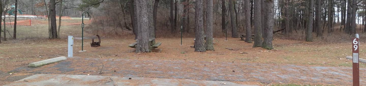 picnic table, fire pit, and electric to the right of camp pad.