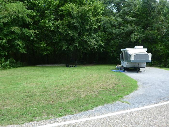 Tyler Bend Main Loop Site# 6-1Site #6, 45' back-in, tent pad 15' x 15'.  Parking area is wide enough for RV & car to park side by side.
