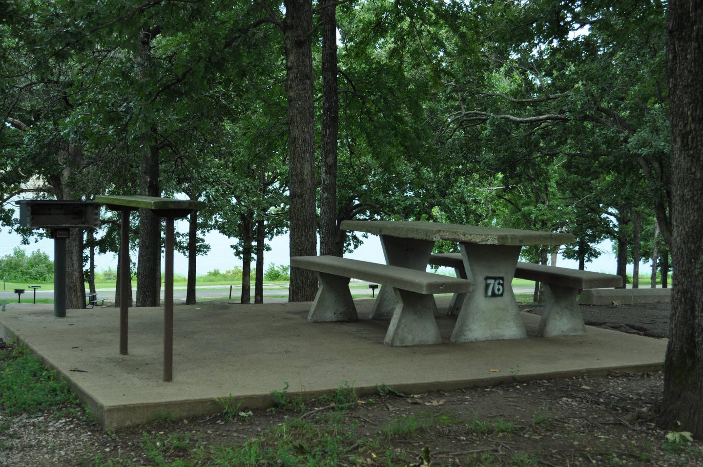 A concrete impact pad with concrete table, pedestal grill and utility table are offered.Site 76 - Taylor Ferry